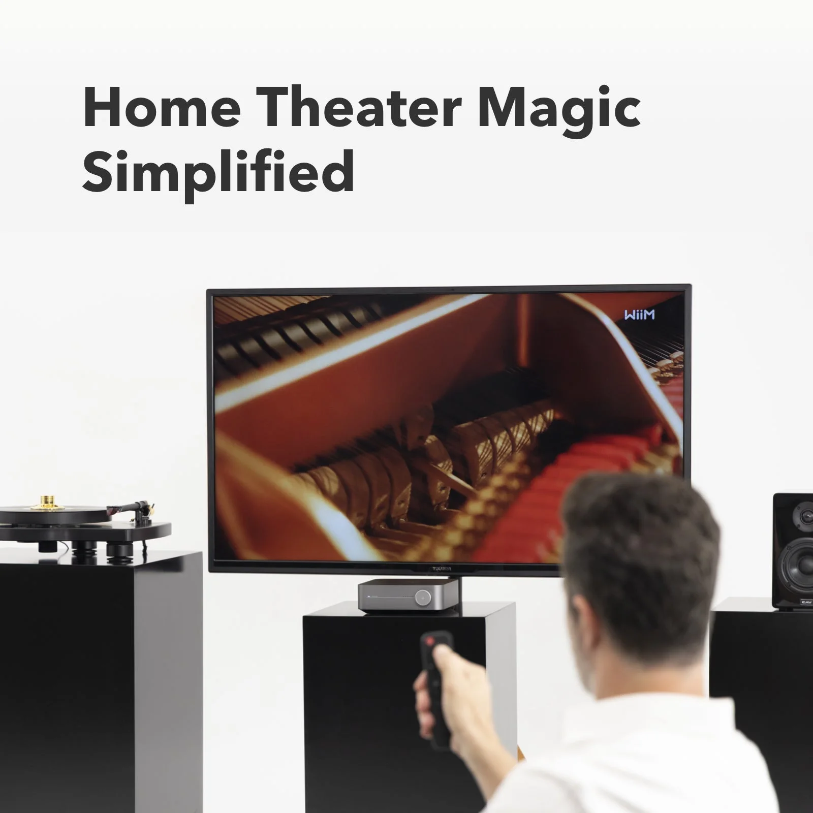 WiiM Amp relié à un téléviseur pour un son home cinéma simplifié